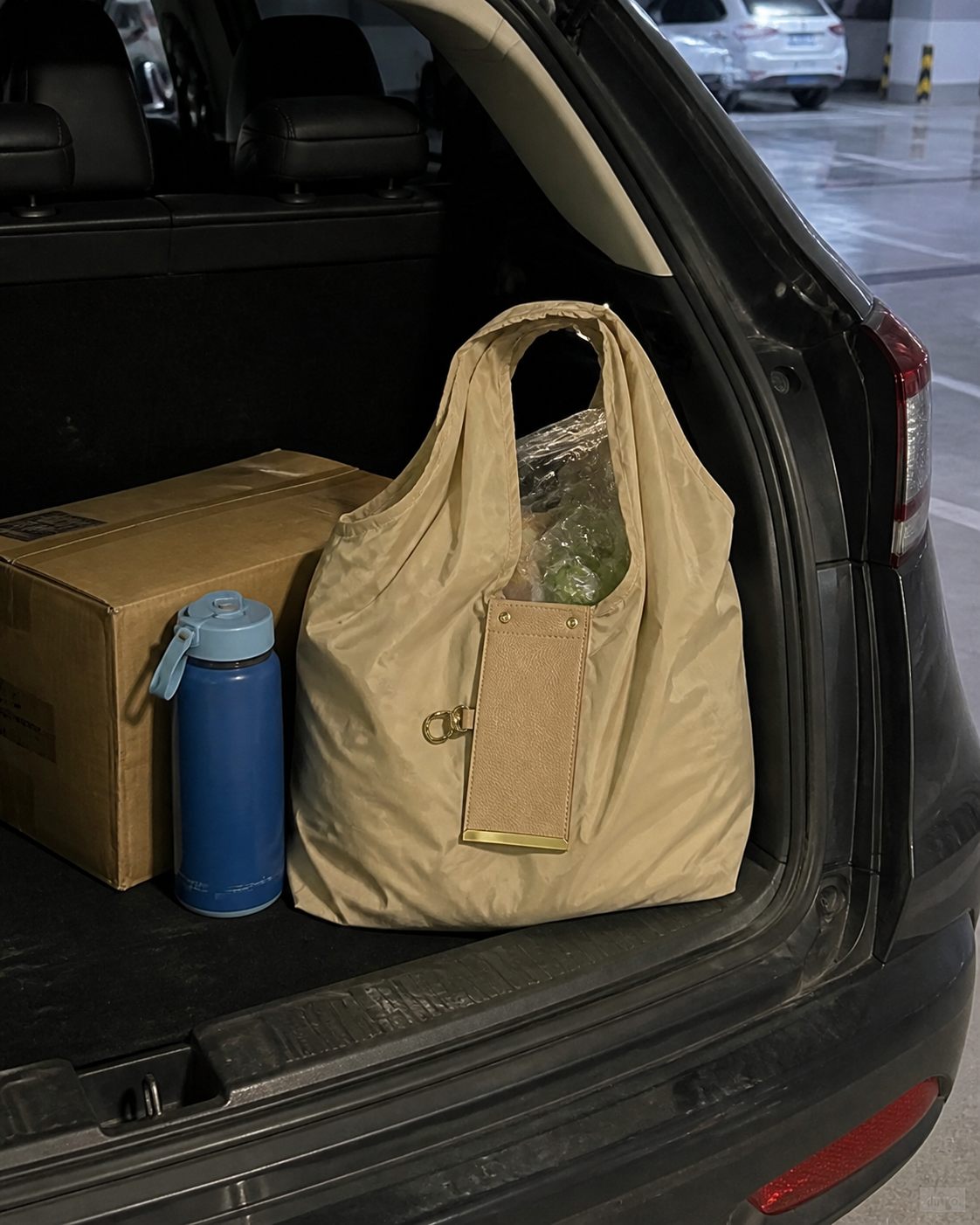 Beige foldable tote in a car boot