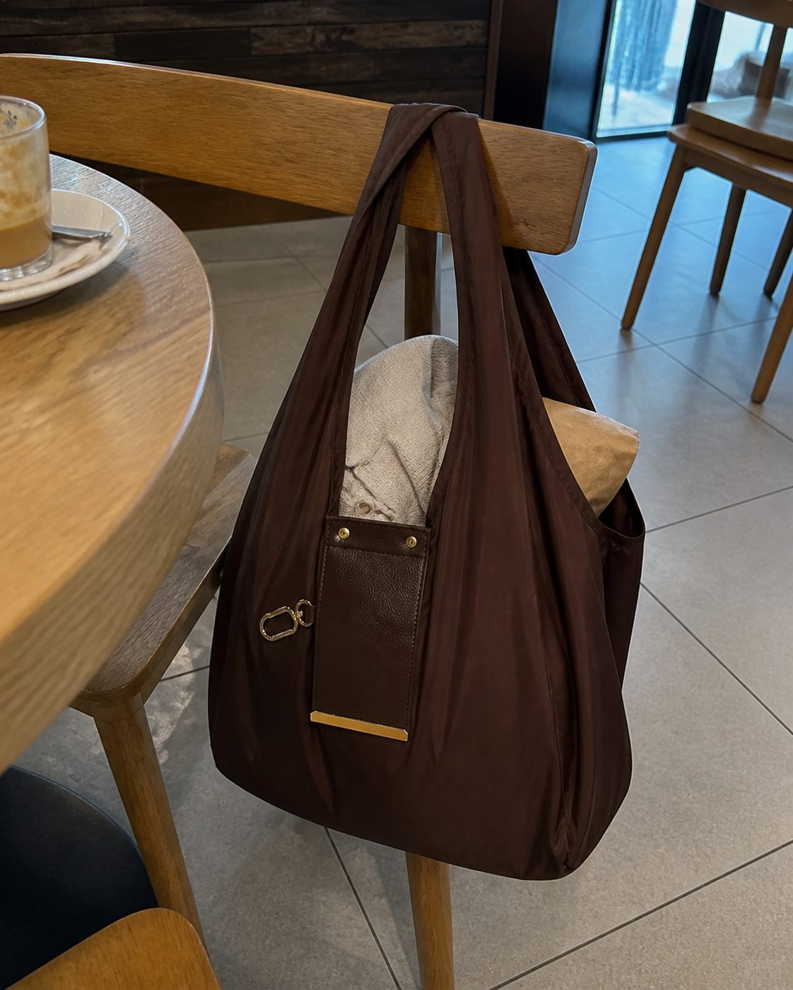 Brown foldable tote at a café