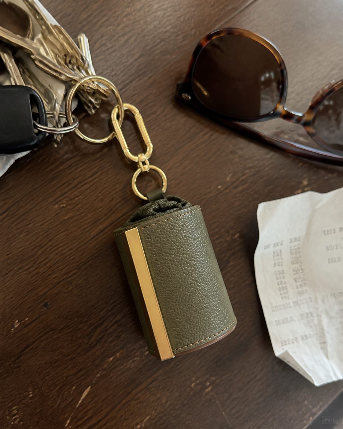 Olive charm on keys